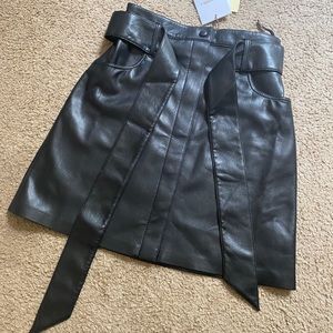4 Designer mini skirts size XS Originally totaling over $1000. Tagged and unworn
